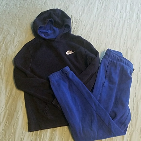 blue nike hoodie and sweatpants